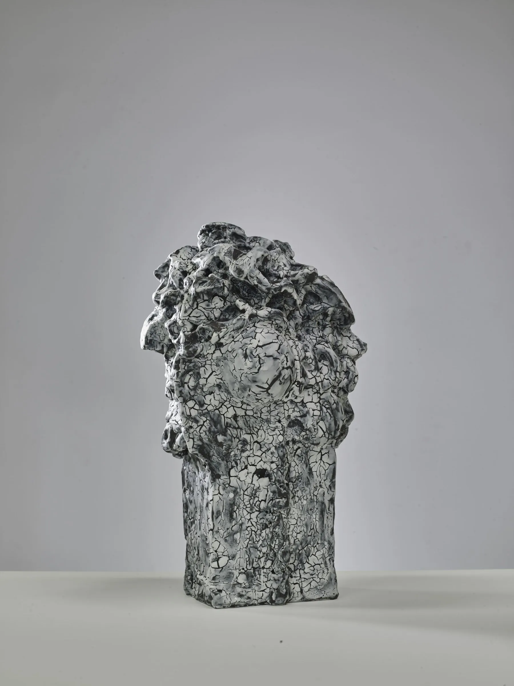 Porous sculpture with a branching, sponge-like head and crackle glaze