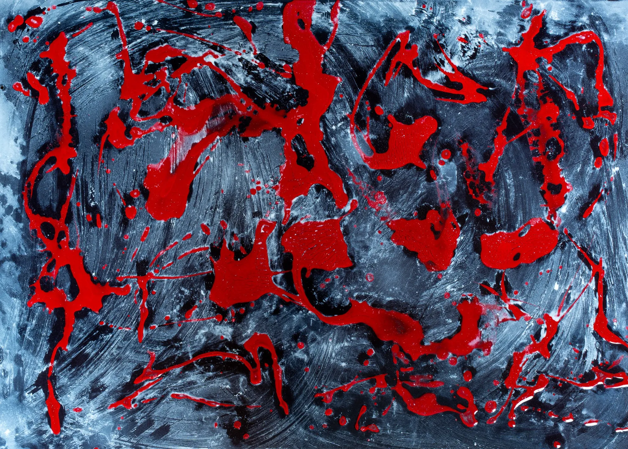 Red shapes on a textured blue grey ground