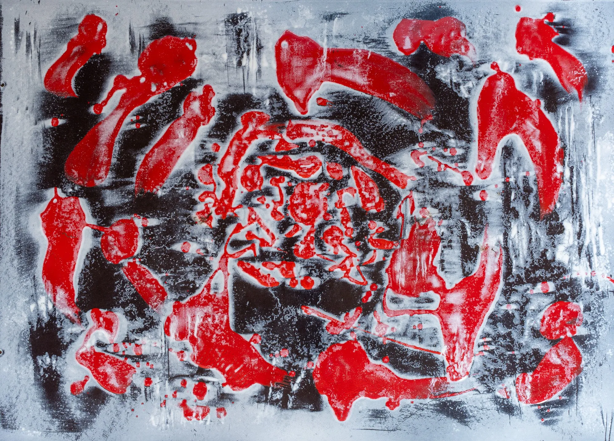Red shapes arranged in a spiral on a grey ground