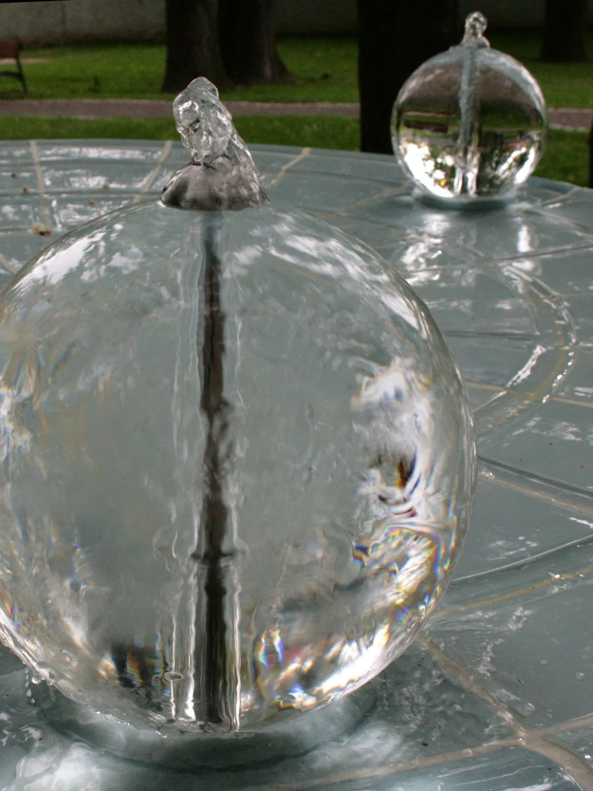 Detail of a glass sphere on the fountain top